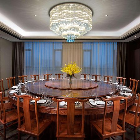 Hotel Ramada Wyndham Zhengzhou Xinzheng à Xinzheng  Extérieur photo