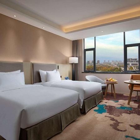 Hotel Ramada Wyndham Zhengzhou Xinzheng à Xinzheng  Extérieur photo