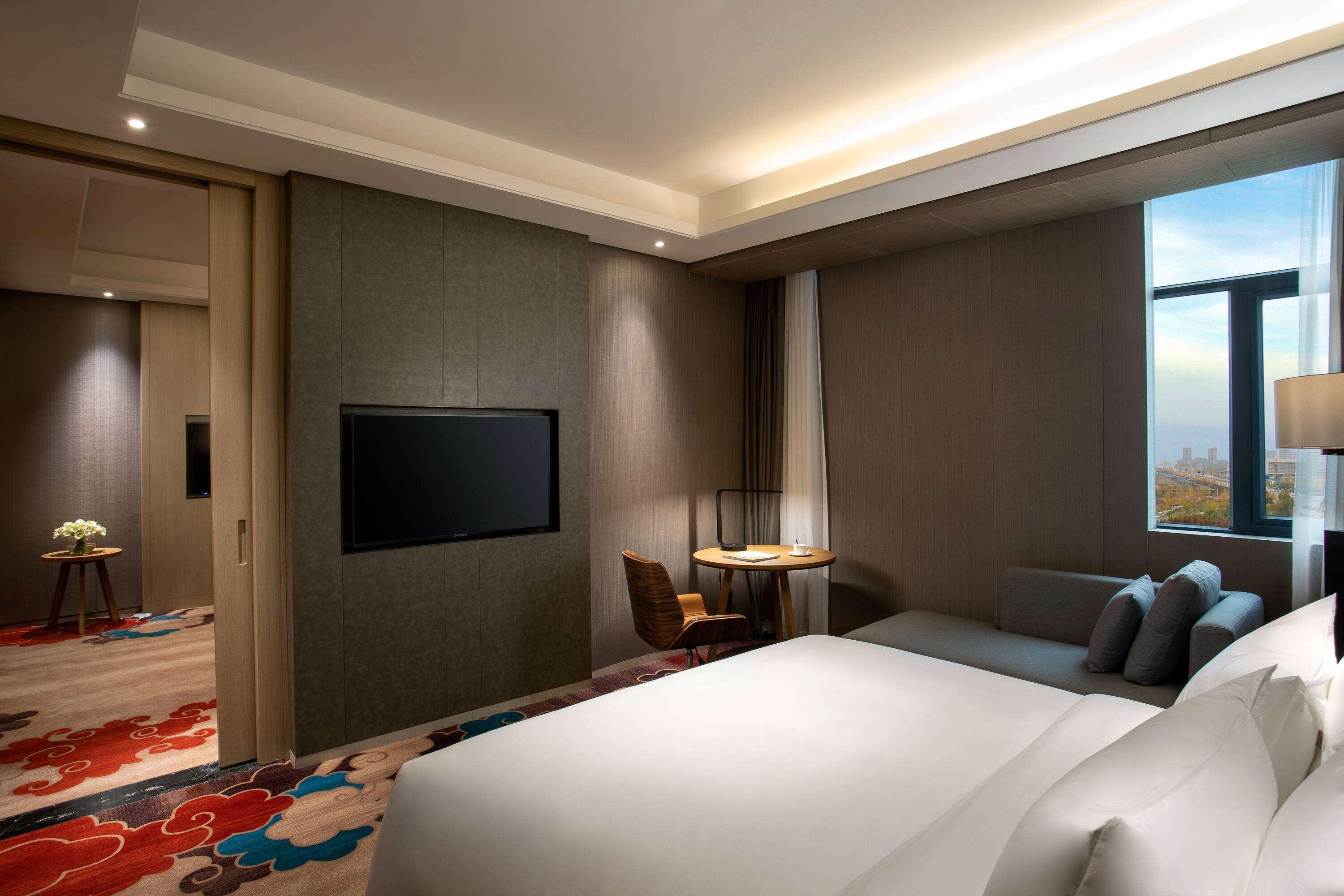 Hotel Ramada Wyndham Zhengzhou Xinzheng à Xinzheng  Extérieur photo