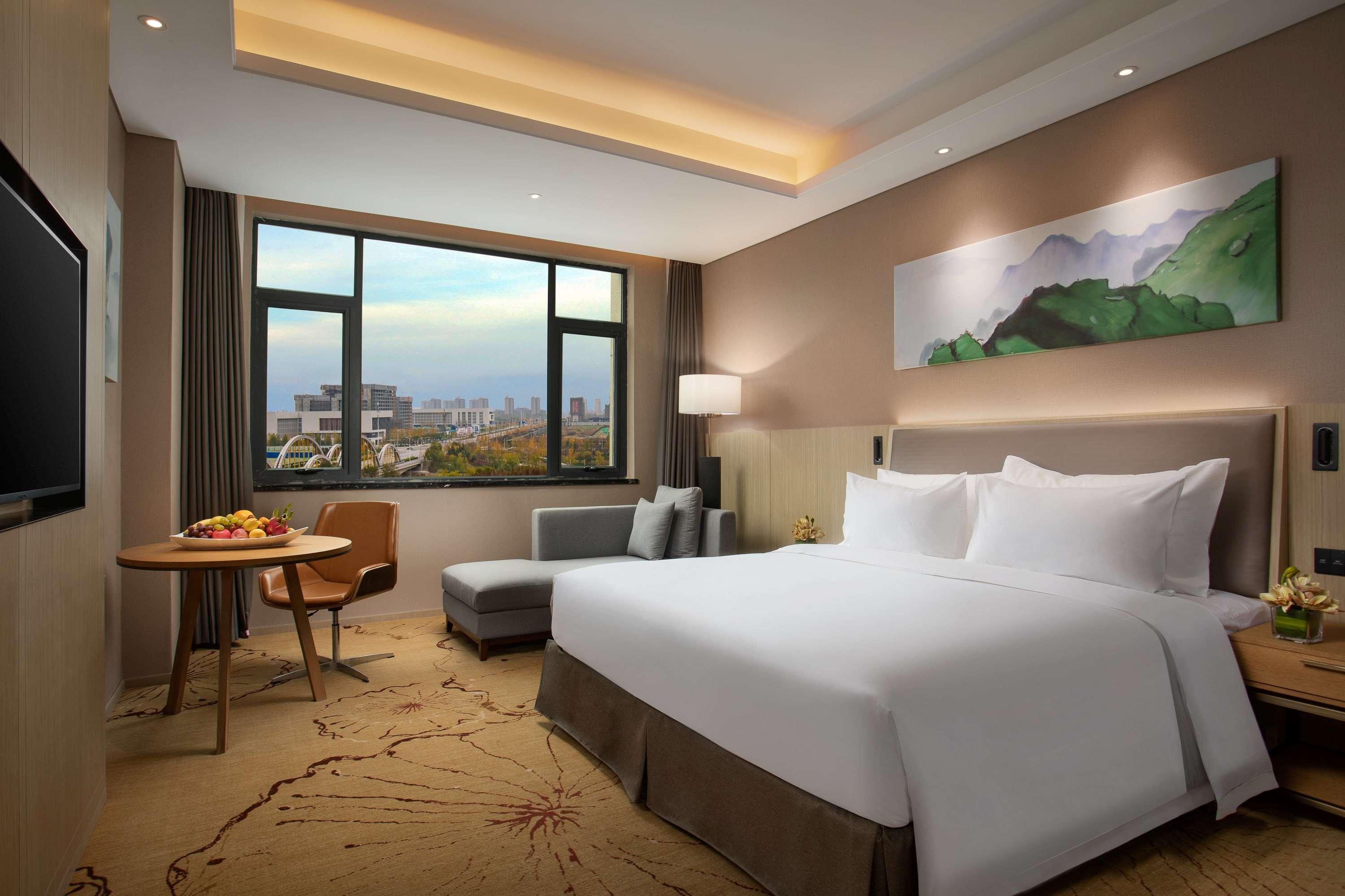 Hotel Ramada Wyndham Zhengzhou Xinzheng à Xinzheng  Extérieur photo
