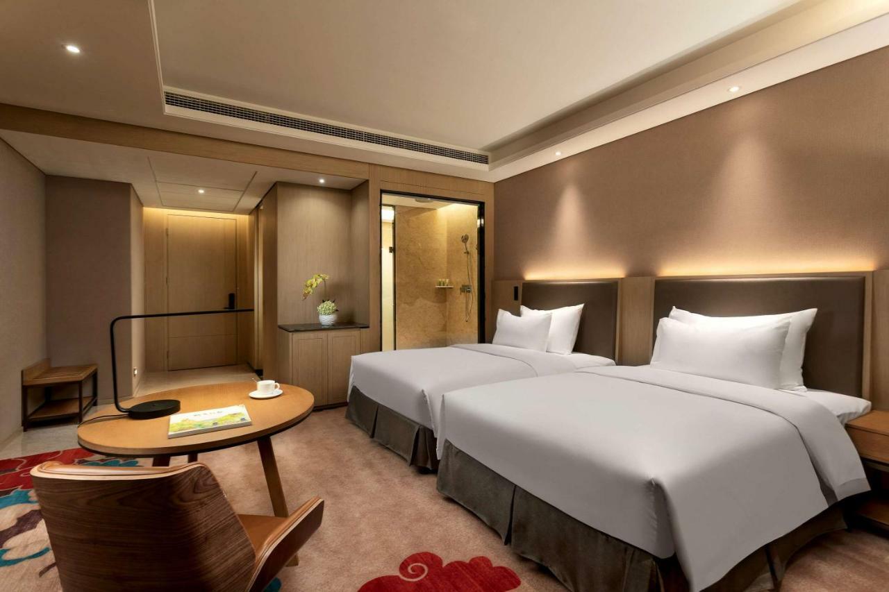 Hotel Ramada Wyndham Zhengzhou Xinzheng à Xinzheng  Extérieur photo